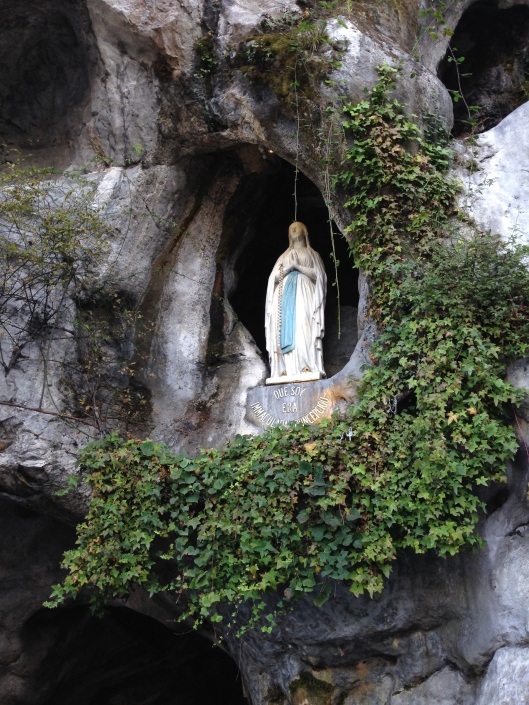 In 1858 Bernadette Soubirous, a 14-year-old peasant girl said that a "lady" spoke to her in the cave of Massabielle (a mile from the town) while she was gathering firewood with her sister and a friend. Similar apparitions of the alleged "Lady" were reported on seventeen occasions that year, until the climax revelation of Our Lady of the Immaculate Conception took place. Bernadette Soubirous was later canonized as a Saint, and many believe her apparitions have been validated by the overwhelming popularity and testament of healings claimed to have taken place at the Lourdes water spring. 