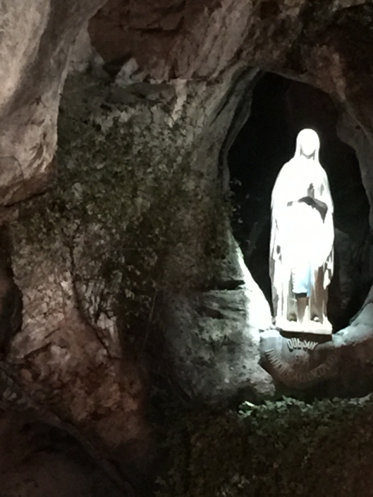 An amazing blessing. Look to the left of the statue, considering the crevice a mouth. Do you see the face of Christ. We only saw this on our last night at the grotto